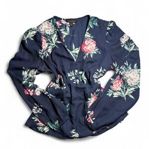 Navy blue floral print long sleeve blouse with V-neck and cinched waist